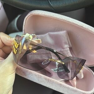 Miu Miu Women's Gold and Black Sunglasses